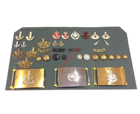 Indian Army post Independence. Maratha Light Infantry, Rajputana Rifles and the Rajput Regiment Insignia. Carded display of t