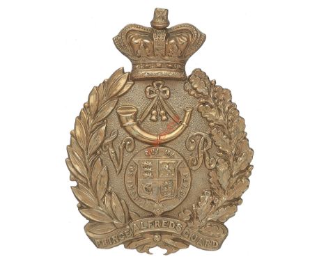 Badge. South Africa. Prince Alfred’s Guard Victorian helmet plate A good die-stamped post 1874 white metal example. Within a 