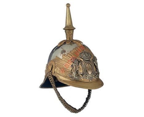 19th / Early 20th Century Continental Officer's Helmet. A good example with silvered skull, to the crown a gilt metal fluted 