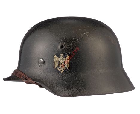 German Third Reich M40 Army Single Decal Steel Helmet. A good rolled edge example retaining much original paint finish and vi