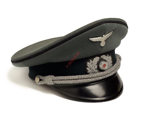 German Third Reich Army Engineer Officer’s peaked cap. A fine example of field grey woollen cloth with black piping to the we