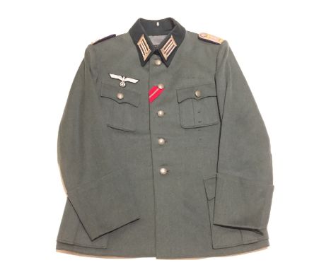 German Third Reich Army Doctor’s tunic. A fine attributed example with turnback cuffs and four pleated pockets by Hermann Kah
