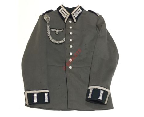 German Third Reich Army Medical senior NCO’s Waffenrock / parade tunic. A fine quality field grey example with blue piping (w