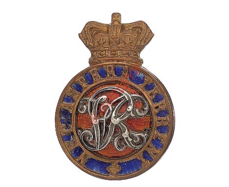 Royal Military College, Sandhurst Victorian Officer Cadet's cap badge. Crowned pierced circlet “Nec Aspera Terrent”' on blue 
