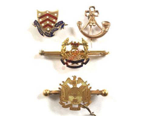 Selection of Gold & Yellow Metal Regimental Sweetheart Brooches. Comprising: Gloucestershire Regiment (Shield pattern device)