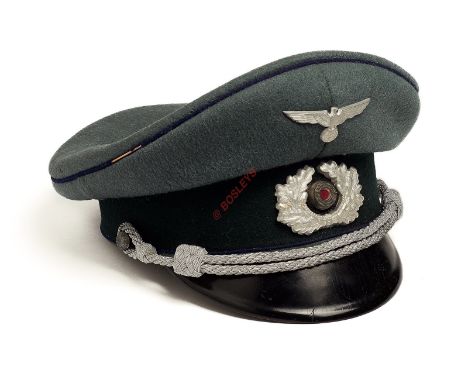German Third Reich Army Medical Officer’s cap. A good field grey example with blue piping to the crown welt and both sides of