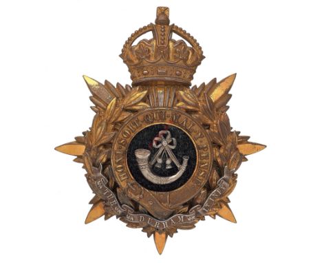 Badge. The Durham Light Infantry Officer’s helmet plate circa 1902-14. A gilt example. Crowned star mounted with laurel wreat