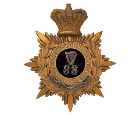 Badge. Irish. 88th Connaught Rangers Victorian Officer’s helmet plate circa 1878-81. A good scarce gilt example. Crowned star