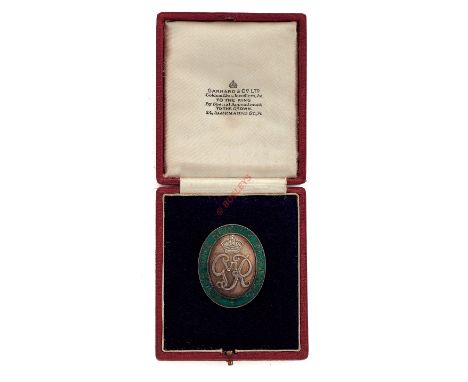 King’s Home Service Messenger’s badge of office. A very fine and rare silver and enamel WW2 example by Garrard & Co., bearing