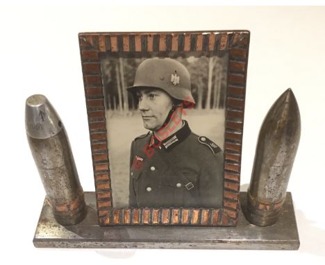 WW2 German Army Trench Art Frame. An unusual WW2 example of a table frame. To the centre a photograph of a German soldier wit