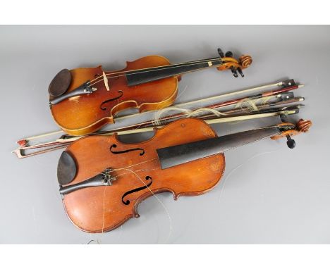 A Vintage Violin 35 cms, the violin in need of complete restoration, in the original case with three bows together with a chi