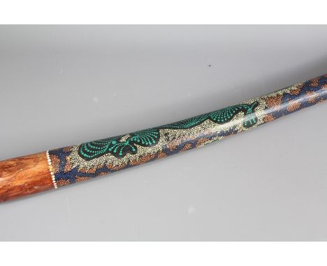 An Australian Didgeridoo; the didgeridoo hand-painted with traditional design lizard, approx 130 cms.&nbsp;
