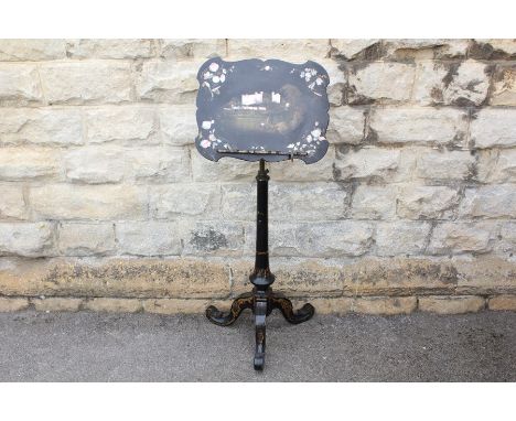 A Victorian Ebonized Music Stand. The stand with mother of pearl highlights and tripod base, approx 46 w x 120 h.