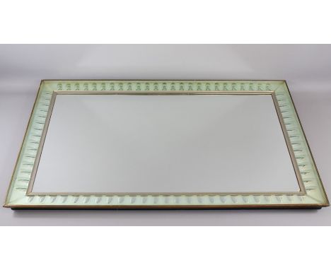 Vintage Bevelled Edge Mirror; the mirror having a brass surround, approx 104 x 65 cms.