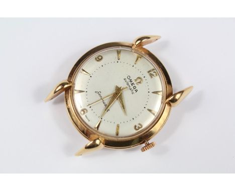 A Gentleman's Omega Seamaster 18ct Gold Automatic Watch; the watch having a white with baton and numeric dial at every quarte