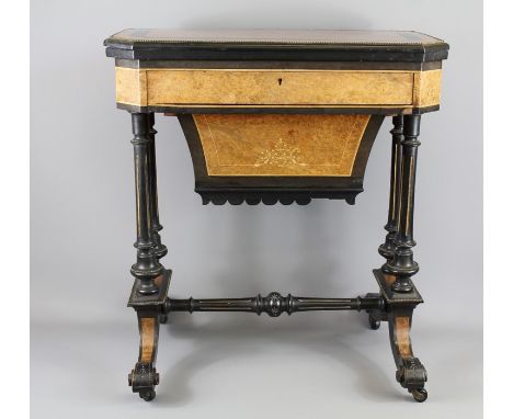 A 19th Century Birdseye Maple Games and Sewing Table. The table with folding swivel top, incorporating a satinwood and ebony 