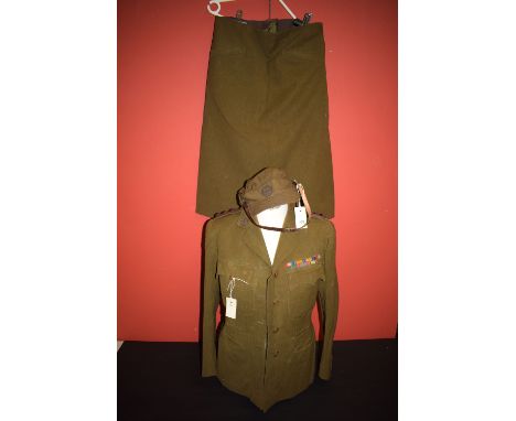 A lady's First World War period Woman's Transport Service, 'First Aid Nursing Yeomanry' (FANY) uniform, the jacket, by Willia