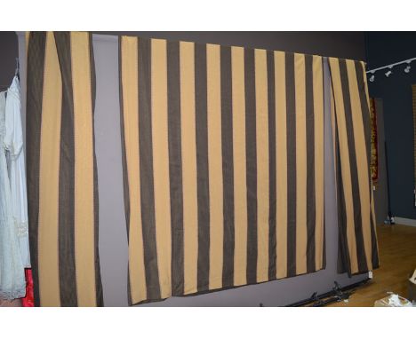 Two pairs of curtains in gold and brown stripe design, 312 x 206cms (approximately measurement of one); together with spear s