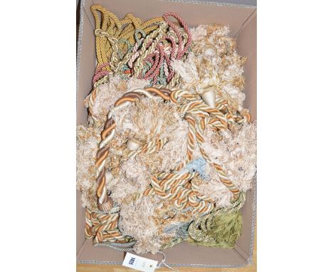 Miscellaneous mid 20th Century tassel tie-backs probably French, in red; green; pink; gold; and others.