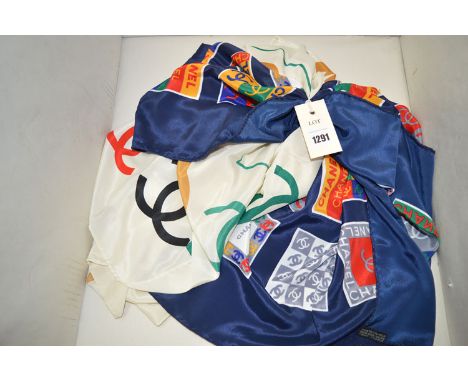 Two Chanel silk scarves; one on cream ground; the other navy, monogram print.
