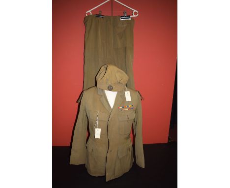 A lady's First World War period Woman's Transport Service, 'First Aid Nursing Yeomanry' (FANY) uniform with six British, Fren
