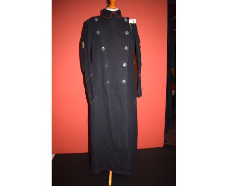 A lady's First World War period Woman's Transport Service, 'First Aid Nursing Yeomanry' (FANY) overcoat, Navy with red string
