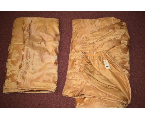 A pair of mid 20th Century silk beige curtains, floral decoration, 270x84cms. each approximately.