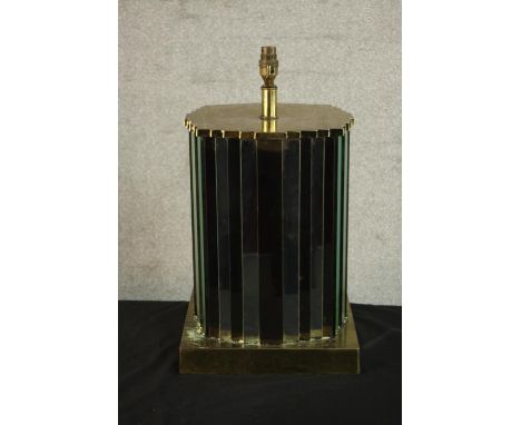 A contemporary bronze and mirrored table lamp on a square base. H.51 W.28 D.29cm. 