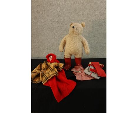 A vintage Paddington Bear complete with assortment of clothes. H.50cm. 