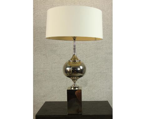 A mid 20th century chrome table lamp after Philippe Barbier, raised on block plinth base. H.93 Dia.48cm. 