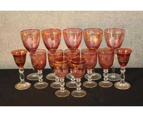 A set of ten 19th century cranberry glass drinking glasses together with four other ruby glass drinking glasses. H.20cm. (lar