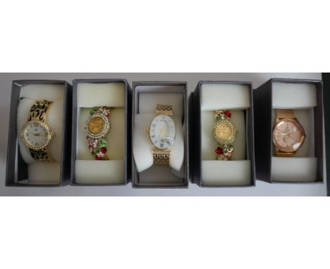 Five new in the box Strada fashion watches, each with a different design, including enamel and rhinestone studded. H.8 W.10 D