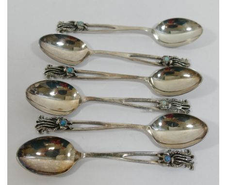 A set of six Australian coffee spoons with opal set terminals, by Dan Flynn, stamped 'STG SIL', combined weight 1.89ozt, 58.9