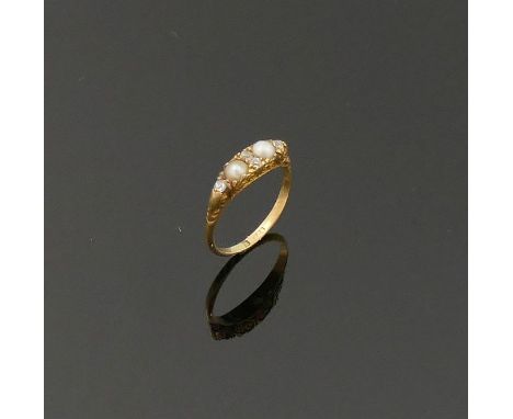 A diamond and half pearl carved half hoop ring, hallmarks rubbed, finger size K, 2.6g gross, boxedCONDITION REPORTS &amp; PAY