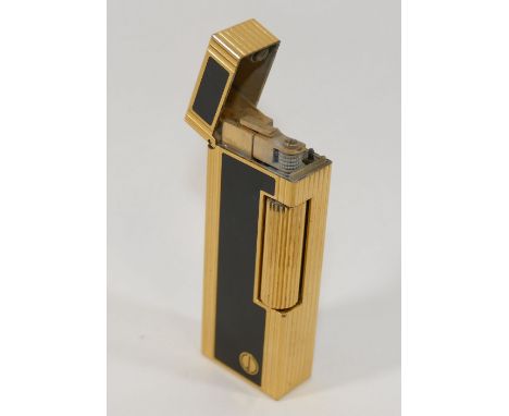 A Dunhill gold plated and black enamel Rollalite pocket lighter, numbered 113351 CONDITION REPORTS &amp; PAYMENT DETAILSIMPOR