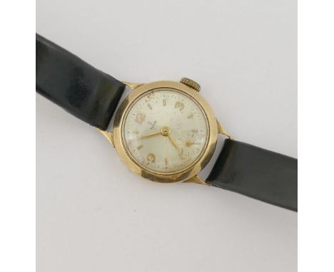 A 1960's Tudor Rolex ladies 9 carat gold cased wrist watch, with 17 jewel movement, the face with baton and Arabic numerals a