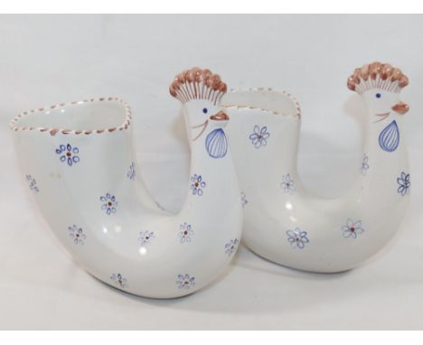 A pair of Rye Pottery chicken vases, the bodies decorated with blue flowers, with factory ink stamp to base, 16cm high x 17cm