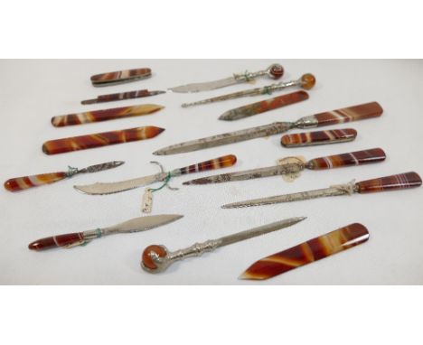 Sixteen banded carnelian and moss agate items including paper knives, button hook, penknives, and nail filesCONDITION REPORTS