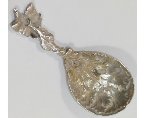 A Victorian silver caddy spoon, cast with acanthus leaf decoration, London 1862 by George W Adams, 9.5cm long, 0.82ozt, 25.3g