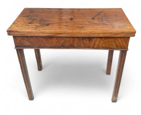 A Chippendale-period tea table In mahogany with folding top on moulded legs. 84cm wide 80cm when open and 74cm high