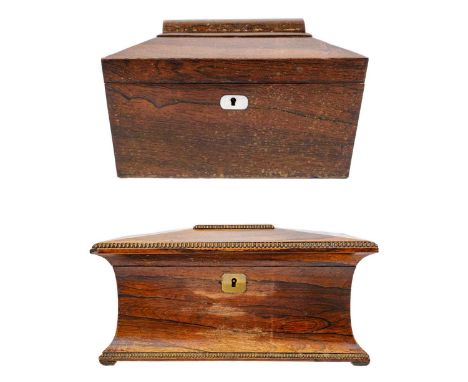 A William IV rosewood tea caddy. Of swept sarcophagus form, with two internal compartments and a recess for a bowl, height 19