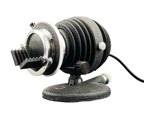 An American Optical Company microscope lamp. Height 18cm.
