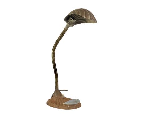 A "Supreme" adjustable desk lamp. With brass clamshell shade and a steel base, fitted a removable ashtray, height 45cm.