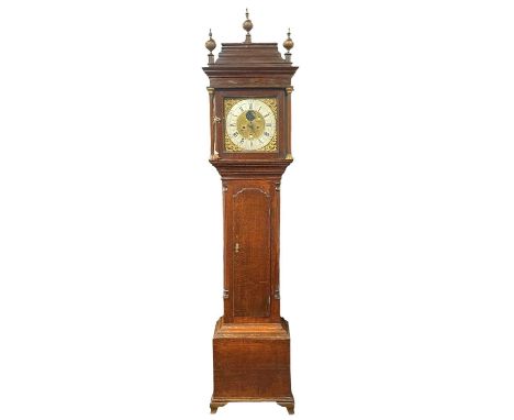 An 18th century oak cased eight-day longcase clock by Edward Barlow, Oldham. The 31cm (12") square brass dial with a penny mo