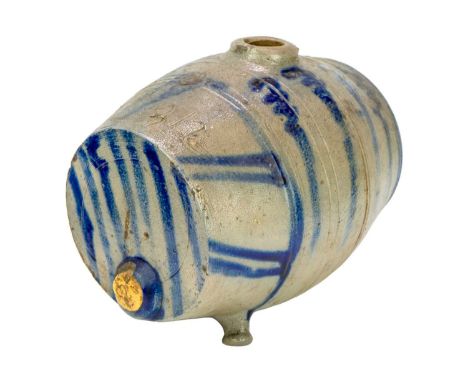 An unusual saltglazed Westerawld type spirit flask. With applied feet and simple blue painted decoration, probably 19th centu