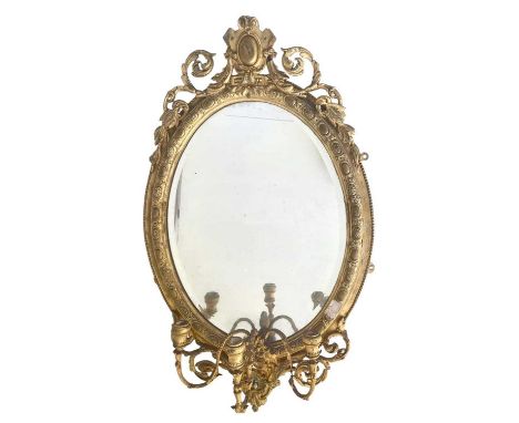 A 19th century gesso gilt girandole mirror. With foliate scrolls, height 94cm width 56cm.