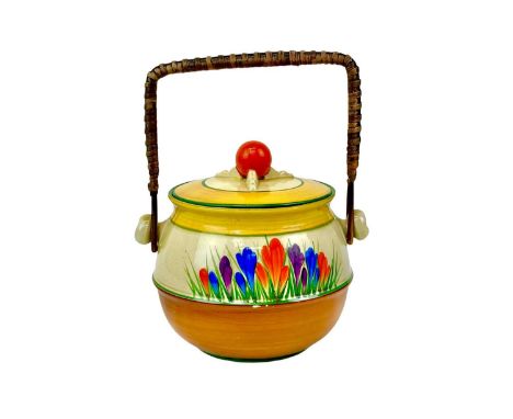 A Clarice Cliff Crocus pattern 335 shape biscuit barrel. Bizarre Wilkinson Ltd marks, height 15cm.