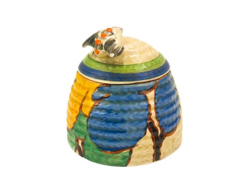 A Clarice Cliff Blue Autumn pattern bee hive honey pot and cover. Bizarre Newport Pottery and Lawleys marks, height 7cm.Small