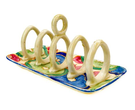 A Clarice Cliff Blue Chintz pattern toast rack. Fantasque Bizarre Newport Pottery marks.Scratches to glaze, no other conditio