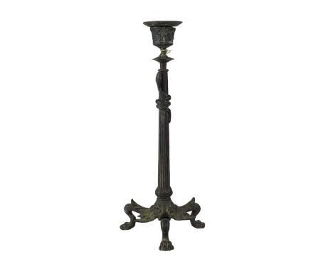 French bronze candlestick. Late 19th century, the fluted column entwined with a snake, the leaf cast base terminating in paw 